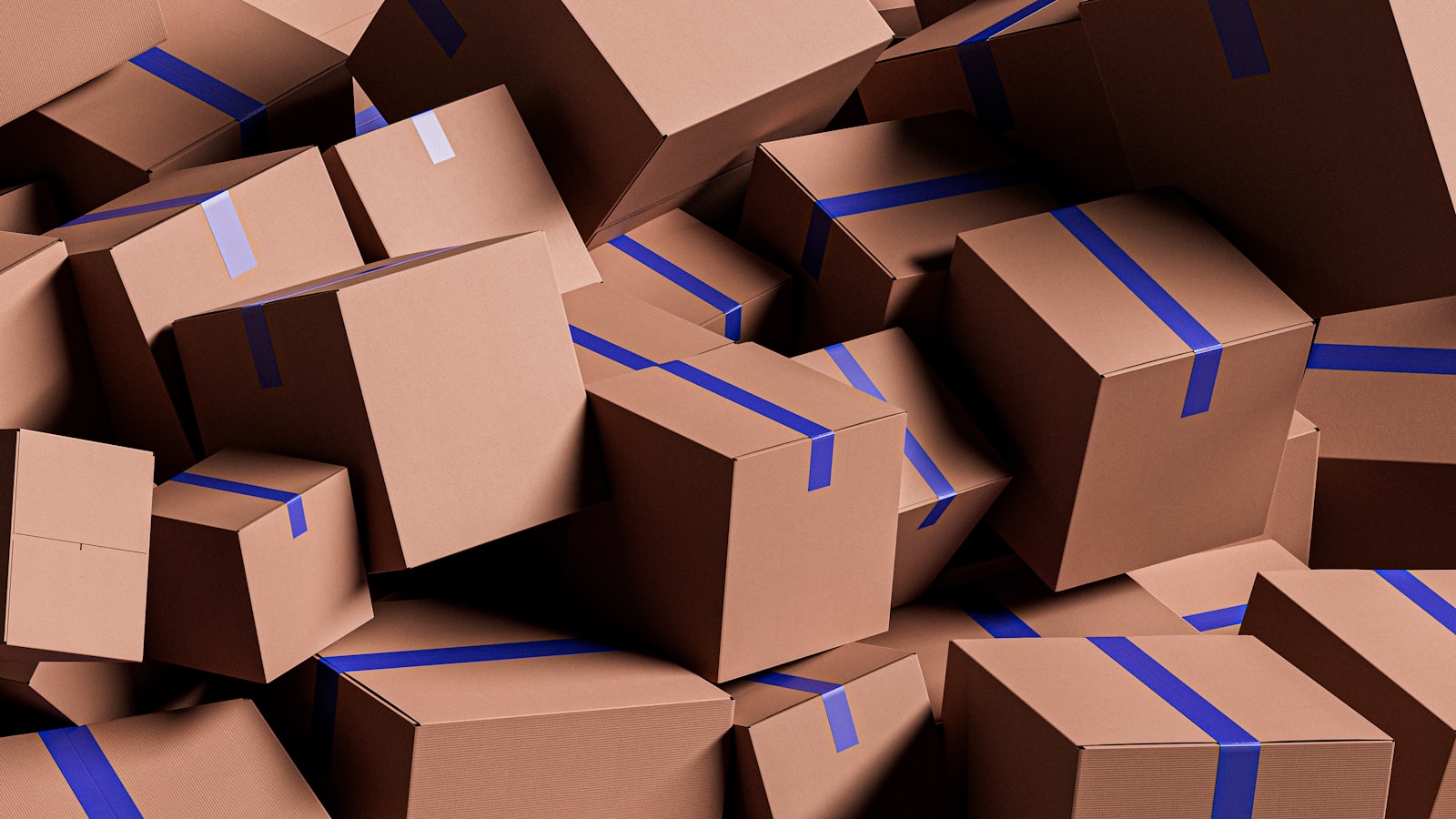 Stacked cardboard boxes sealed with blue tape